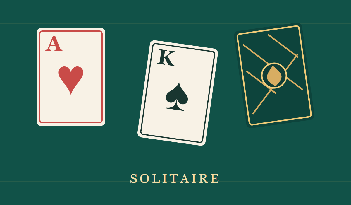 Solitaire cards arranged on a green felt table